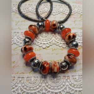 Elegant Orange and Silver Beaded With Black Stretch Bracelets